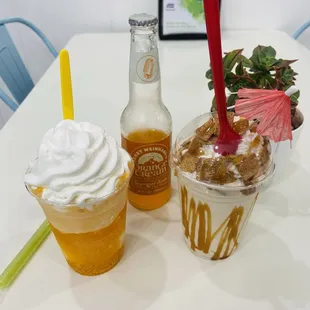 Orange cream soda float with whip cream on top and an horchata shake