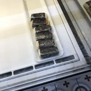 a tray of sushi
