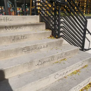 a set of stairs with writing on them