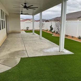 a patio with artificial grass