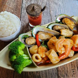 a plate of seafood and rice