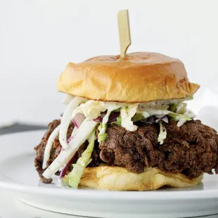 Crispy Chicken Sandwich, Jicama Slaw, Pickles, Hot Honey on Potato Bun