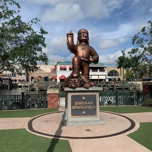 a statue of a little boy