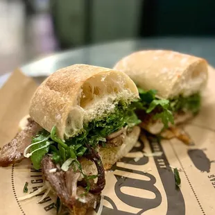 Porchetta - slow roasted pork, caper mayo, arugula, gremolata, parmesan - yum!