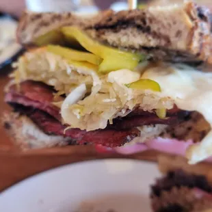 a plate of food with a sandwich on it