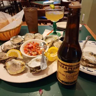 Beautifully shucked oysters. Topped each with Pico de Gallo and a squirt of lemon juice and of Worcestershire sauce.