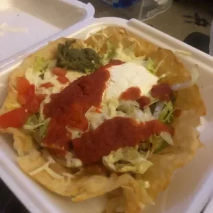 Veggie taco salad With beans, rice, grilled mushroom, green peppers, &amp; onions. salsa &amp; sour cream &amp; guac. Delicious!