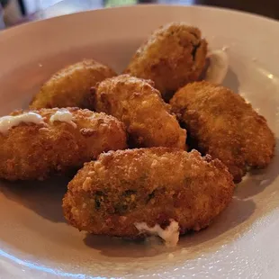 a plate of fried tater tots