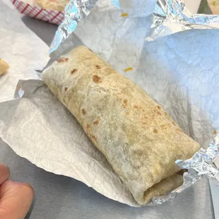 Traditional burrito with spicy carnitas.