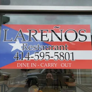 a sign in the window