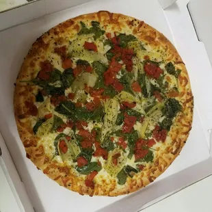 Large white pizza with spinach, artichoke, and roasted red peppers!