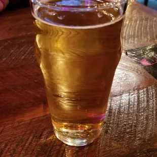 a glass of larimer beer