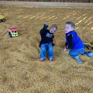 Sandbox but with corn!!! Genius!!!!! The kids love, love, love it!!!