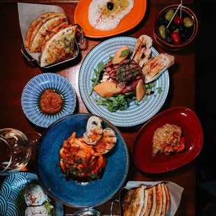 Tzatiki, Muhammara, Hummus, Burrata, Calamari, Eggplant