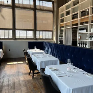 a dining room with tables and chairs