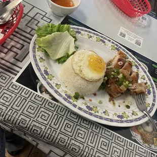 added a fried egg to my grilled chicken plate  F07. Com Ga Nuong