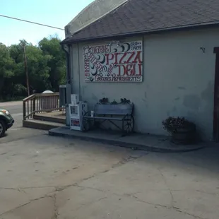 a bench in front of a building