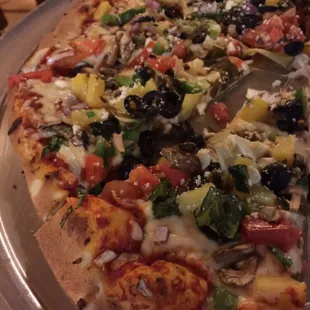 Green Thumb pizza with pineapple and feta cheese!