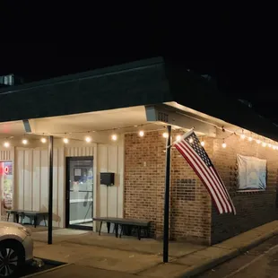 a car parked in front of a restaurant