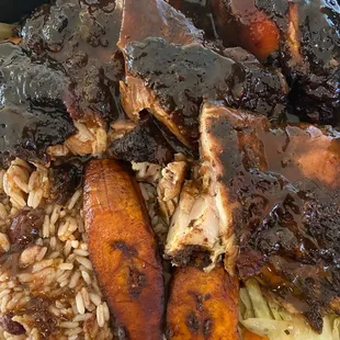 Jerk Chicken, beans and rice, Steamed Cabbage, Fried Plantain