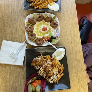 three plates of food on a table