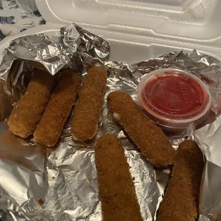 a tray of deep fried chicken nuggies