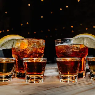 a variety of alcoholic drinks on a table