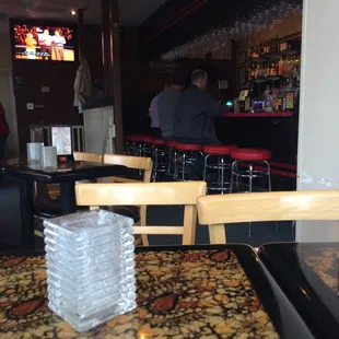 a view of the bar from the dining room