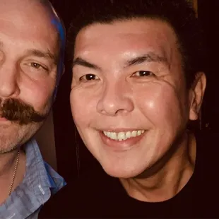 a man with a moustache and a man with a moustache