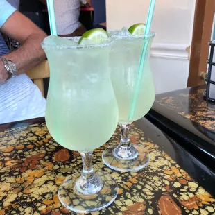 two glasses of lime margarita