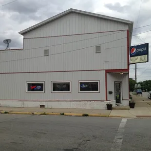 Outside, door on right.