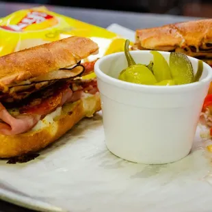 a sandwich and pickles