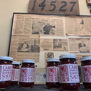 jars of barbecue sauce on a shelf