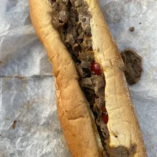 Philly Cheesesteak w/cheese whiz, hot peppers, and Mayo.