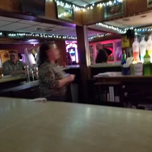 a woman at the bar