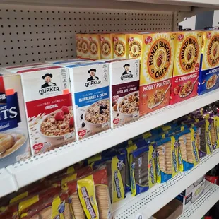 a variety of cereals on shelves