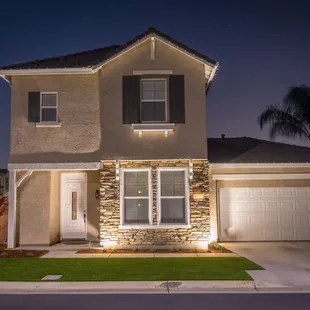 Front of my house after Justin re-landscaped and added some lighting. Looks like a different house!