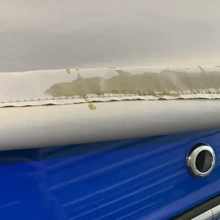 Oil on tarp. Their mistake caused a mess.