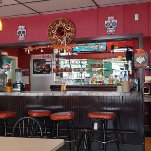 a mexican restaurant with red walls