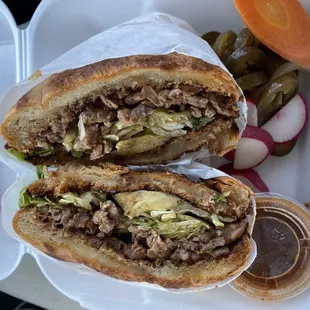 Carne Asada Torta. Delicious. Indifferent about the red salsa but that's the only complaint I have.