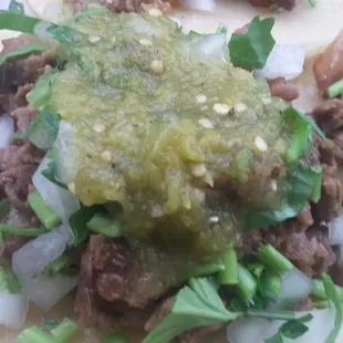 Asada taco with yummy green sauce