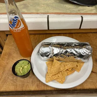 Gigantic burrito, Mexican Fanta, and fresh guacamole!