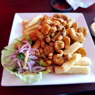 Jalea - fried seafood and fish,onion salad and fried yuca