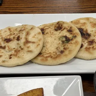 Pupusas (pictured cheese &amp; jalapeños; pork &amp; cheese; cheese &amp; loroco)