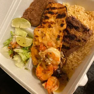 a meal in a styrofoam container