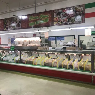 a deli display in a grocery store