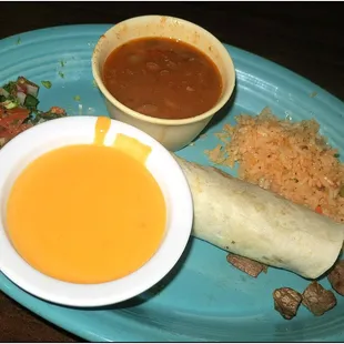 Taco El Carbon (how many remember Mama Ninfa?) with charro beans, queso, guacamole and rice.