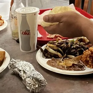 Chimichangas, steak fajitas, and tamale plate.
