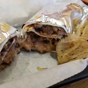 Fajita burrito with cheese.