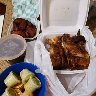 $20.49 family meal - one whole chicken, black beans, fried plantains, and sauces.